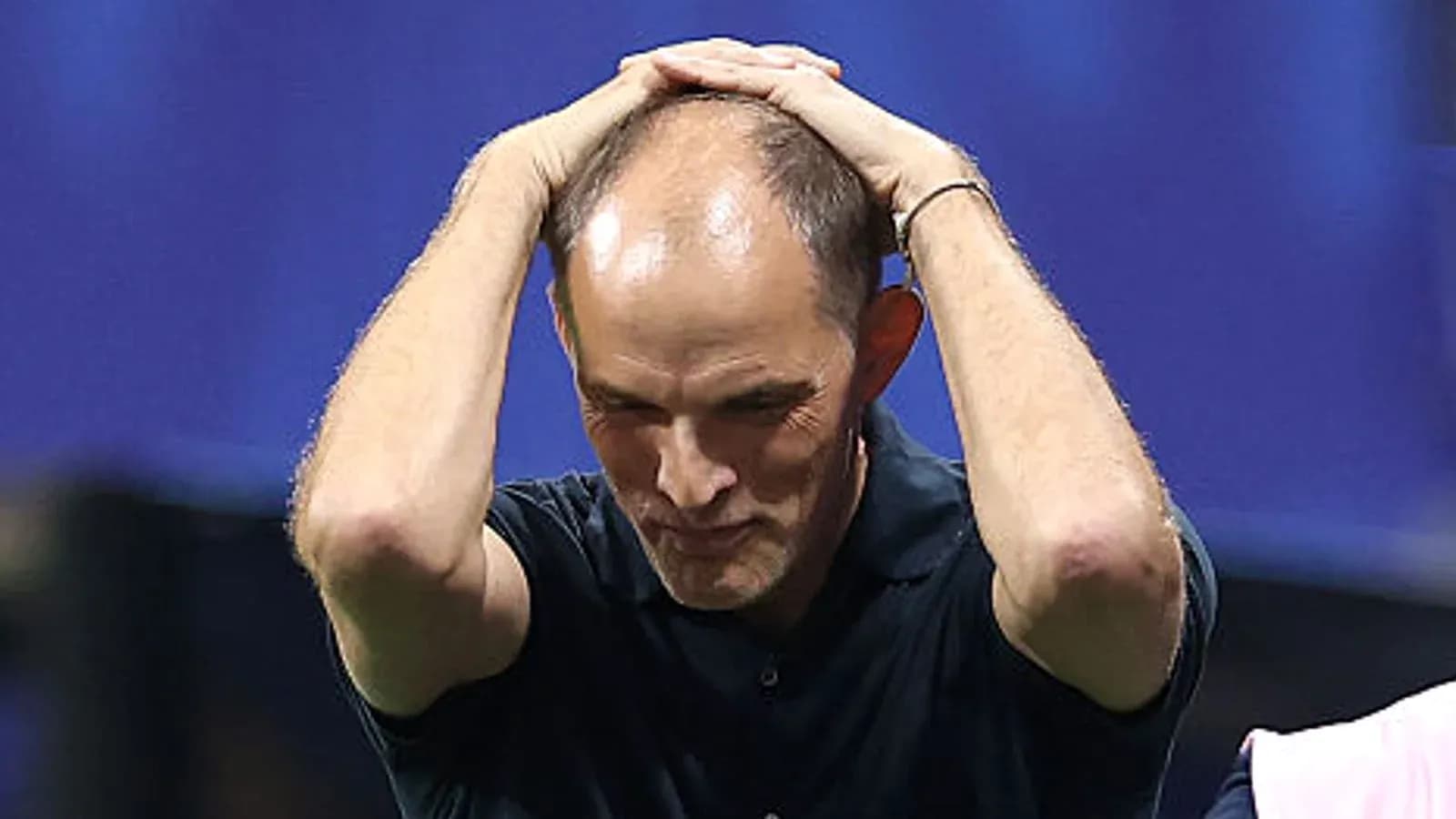 Coach holding head during match reaction Coach holding head during match reaction