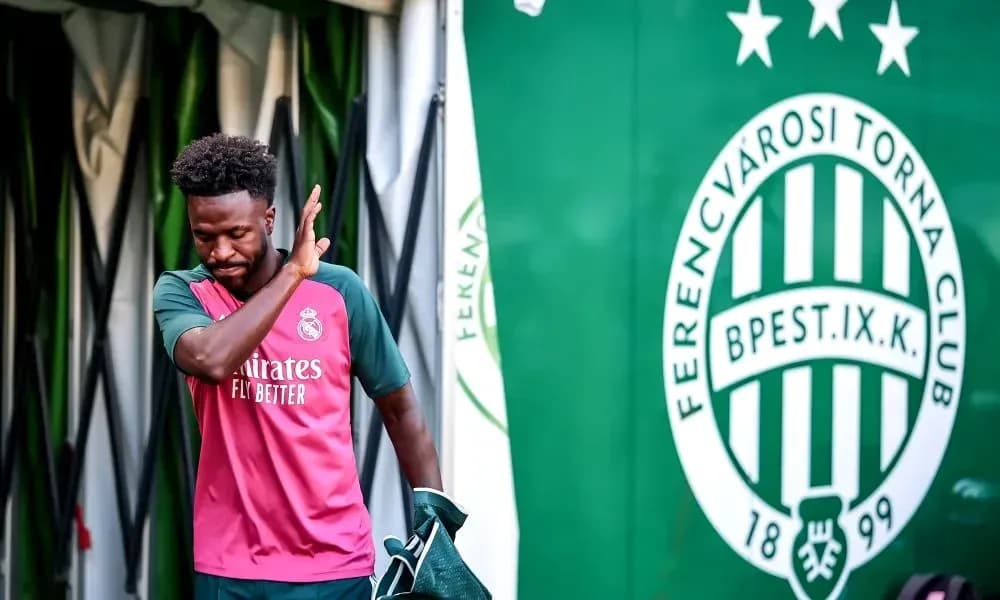 Player exiting tunnel with Ferencvárosi club logo behind Player exiting tunnel with Ferencvárosi club logo behind