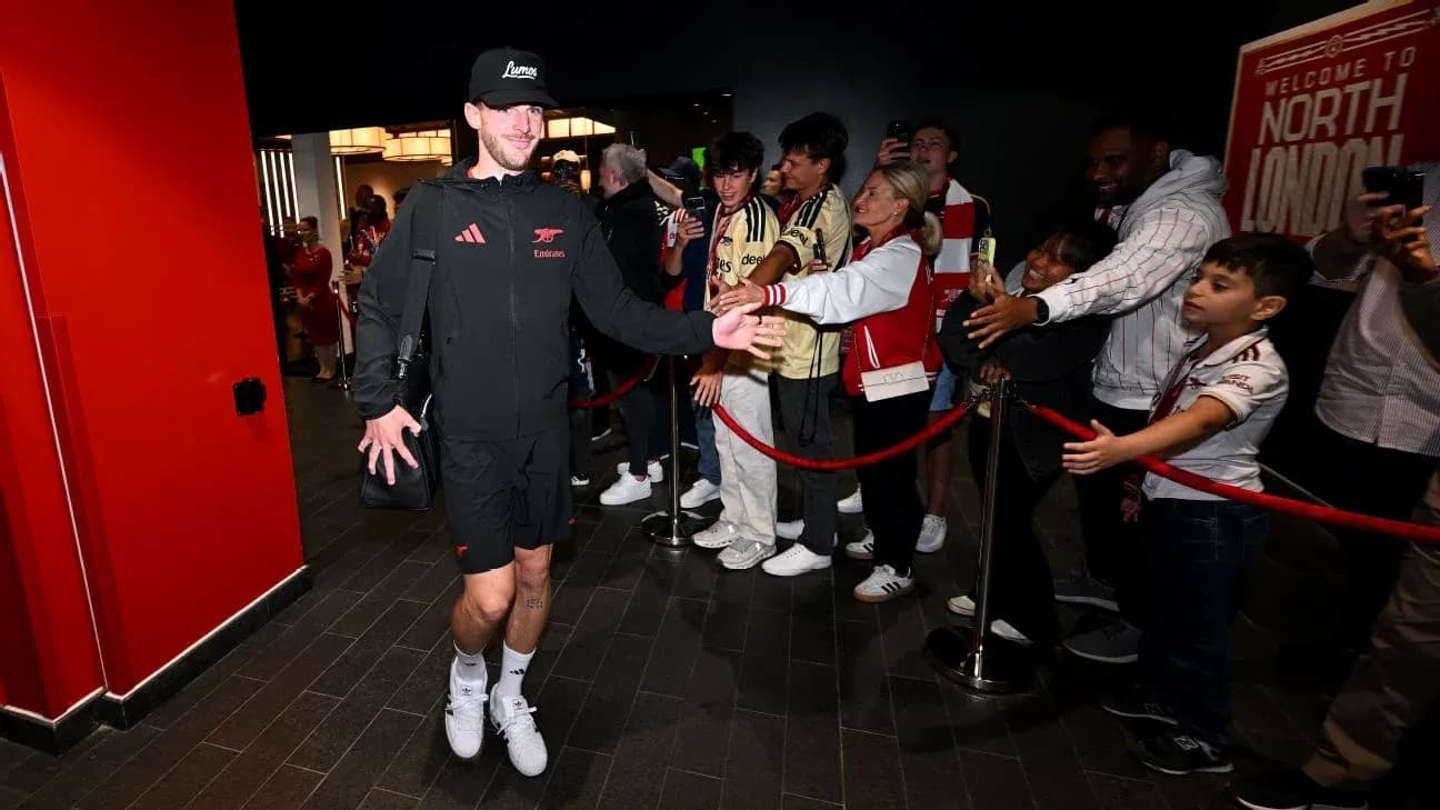 Player greeting fans at entrance before match Player greeting fans at entrance before match