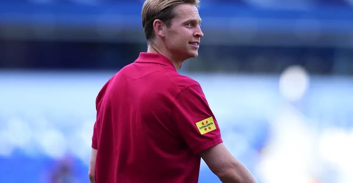 Official in red shirt observing the pitch Official in red shirt observing the pitch