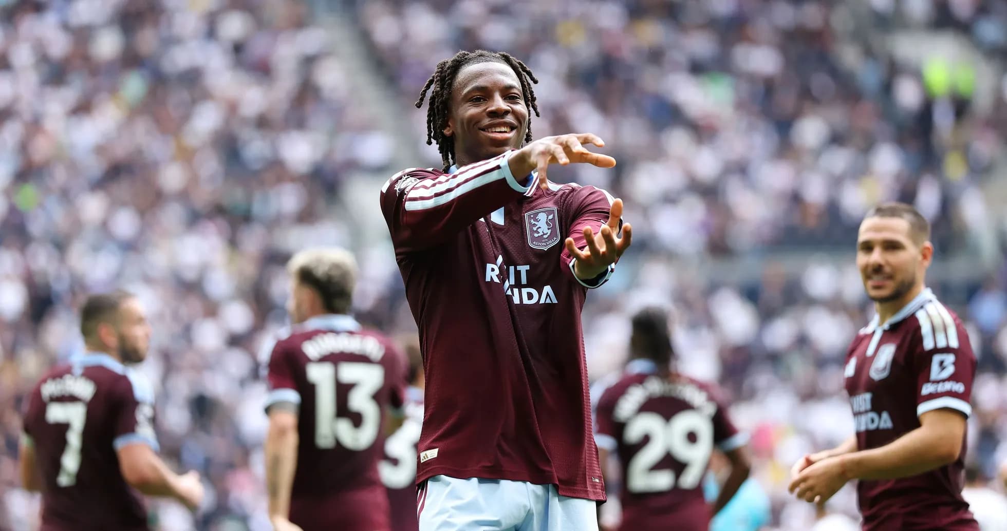 Player celebrating with teammates during match Player celebrating with teammates during match