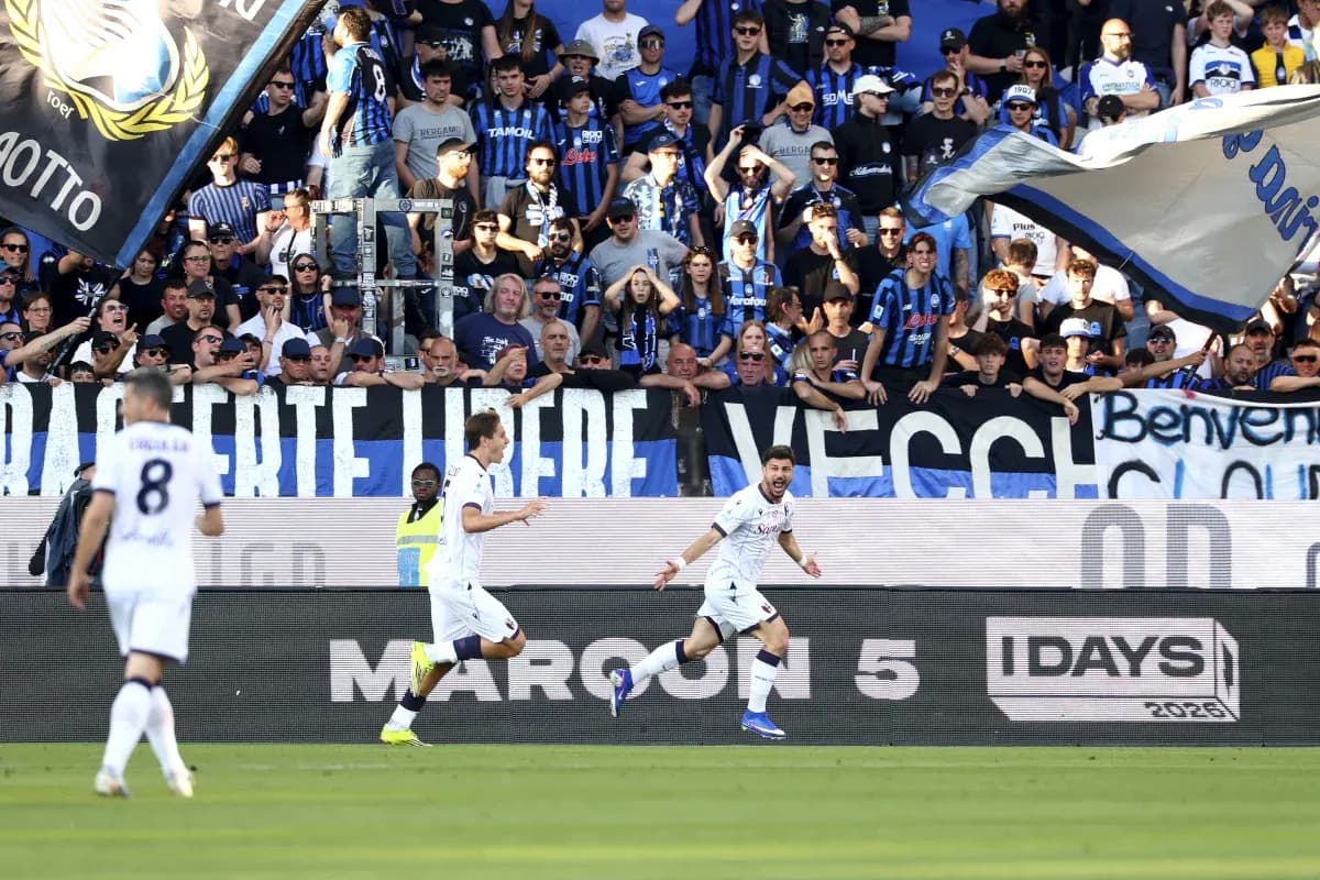 Players celebrating goal with fans in stadium Players celebrating goal with fans in stadium