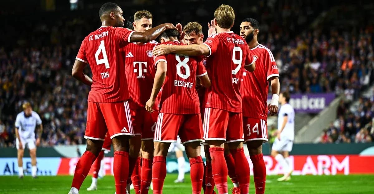 Bayern Munich players celebrating a goal together Bayern Munich players celebrating a goal together