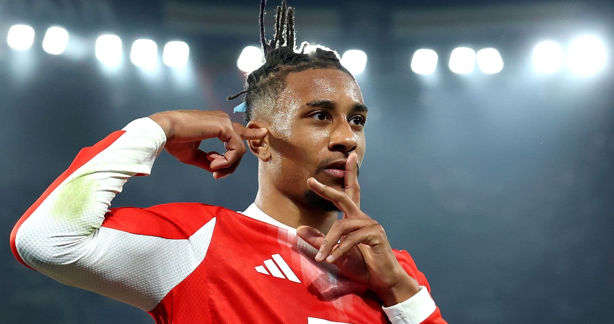 Player celebrating with finger to lips gesture Player celebrating with finger to lips gesture