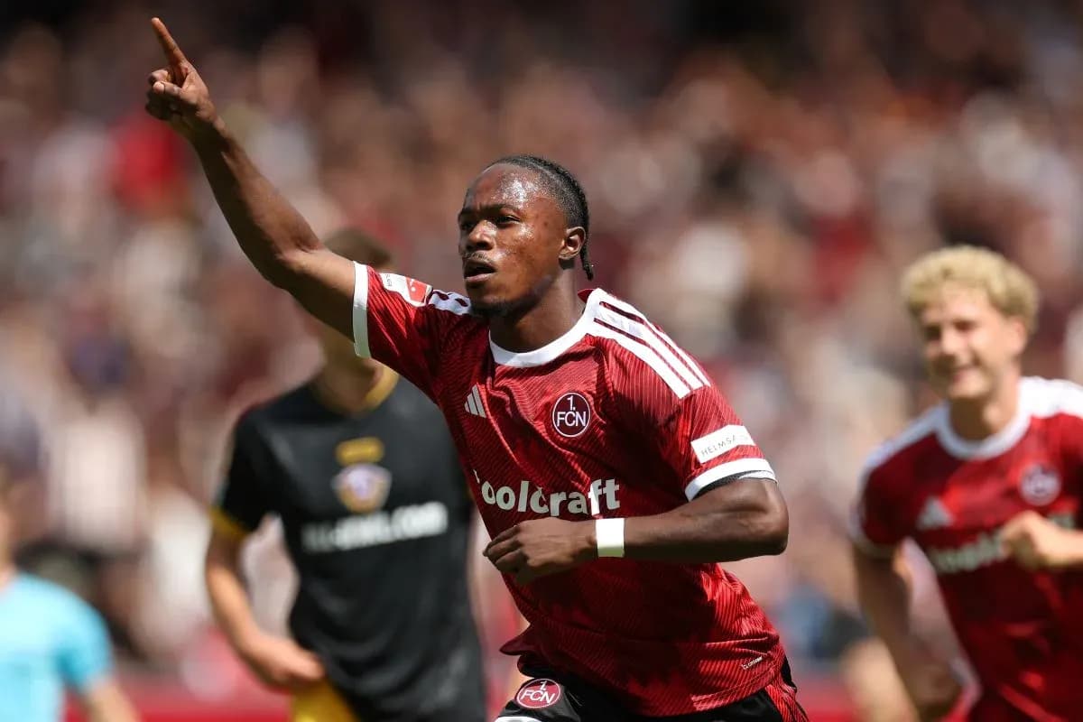 Player celebrating a goal during a match Player celebrating a goal during a match