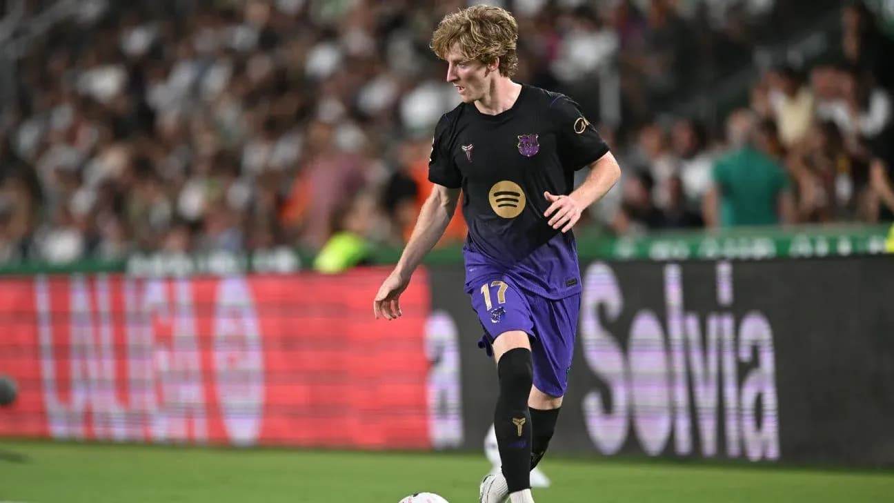 Player in Barcelona kit dribbling the ball during match Player in Barcelona kit dribbling the ball during match
