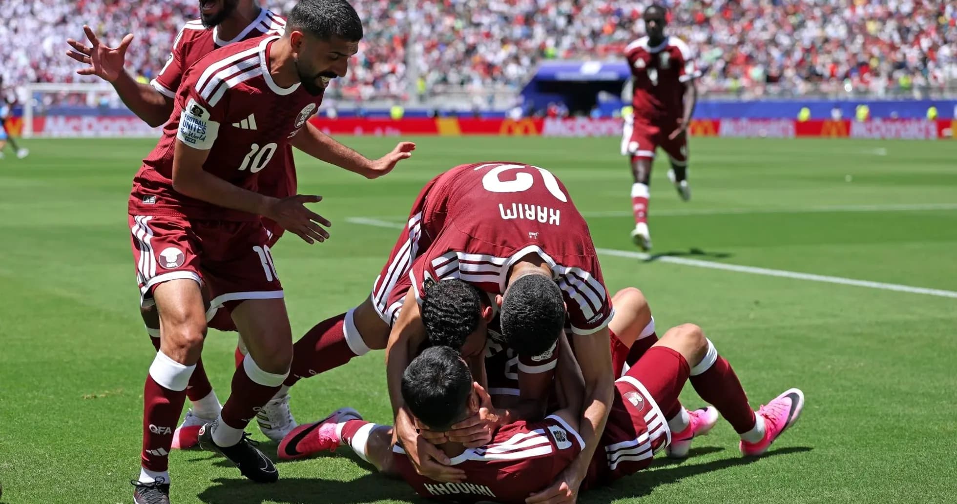 Qatar players celebrating a goal during match Qatar players celebrating a goal during match