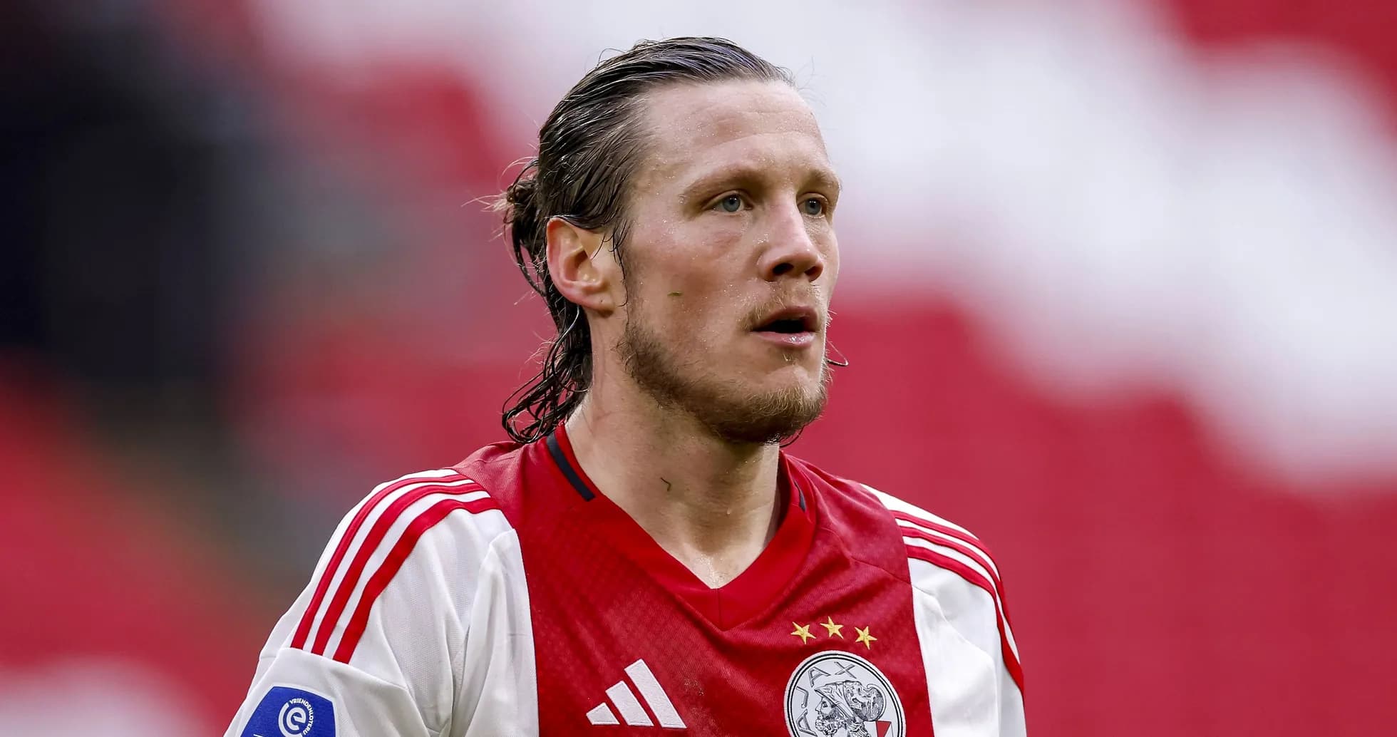 Player wearing Ajax jersey during a match Player wearing Ajax jersey during a match