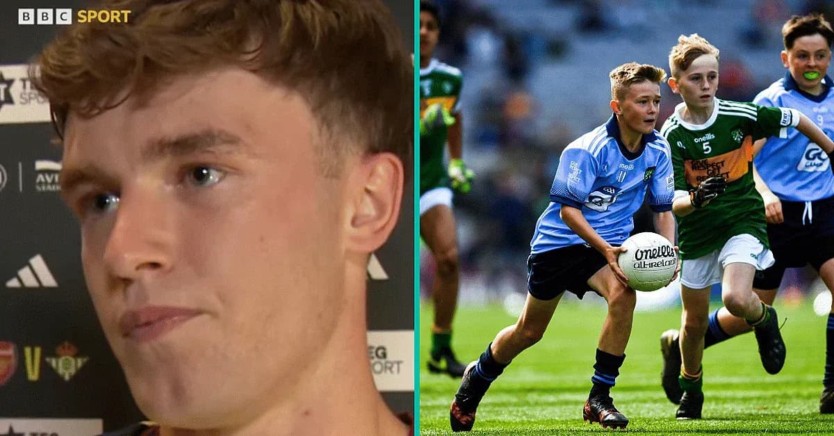 Young players competing for a Gaelic football during match Young players competing for a Gaelic football during match