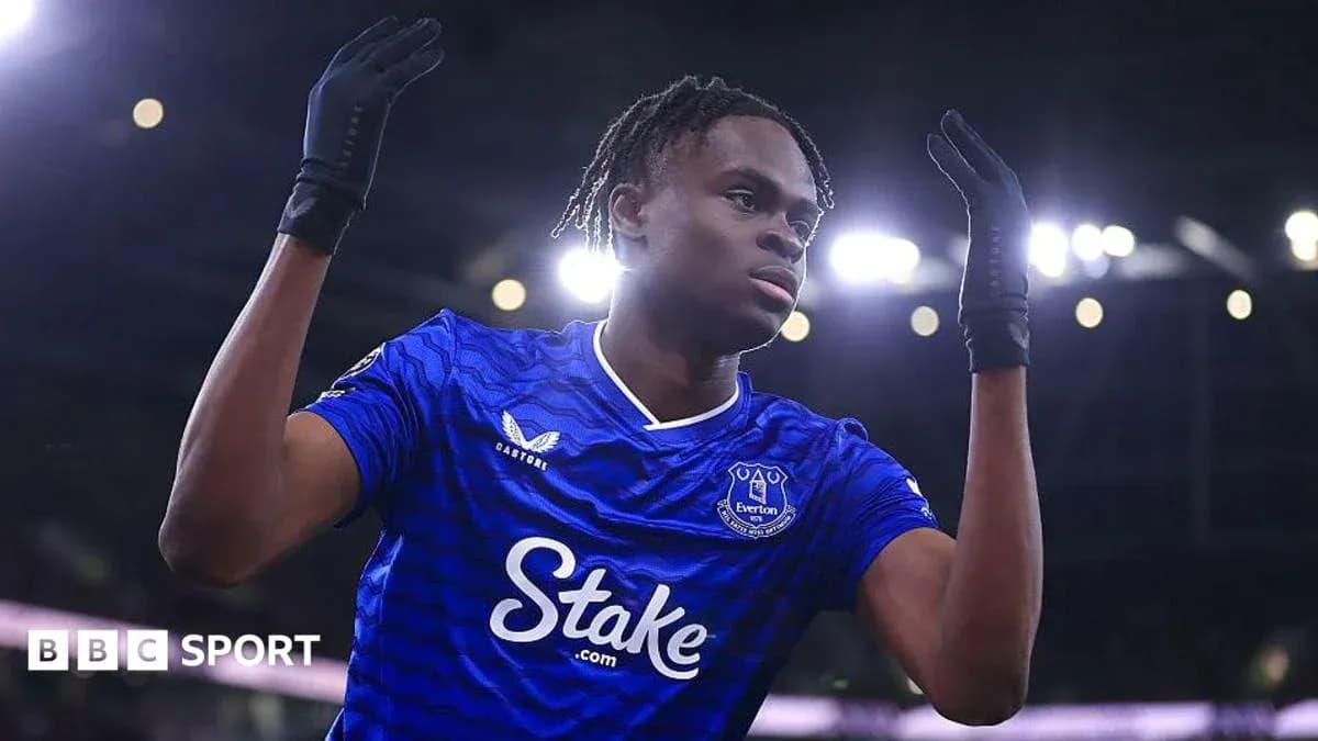 Player celebrating a goal in Everton jersey Player celebrating a goal in Everton jersey