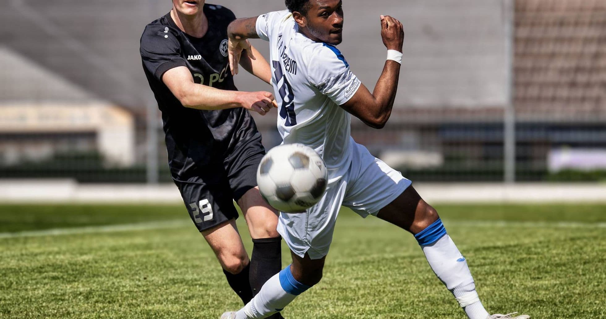 Player tackling opponent during Monheim vs Germania match Player tackling opponent during Monheim vs Germania match
