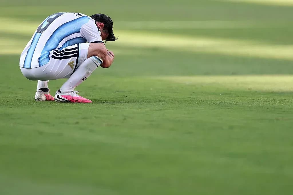 Player kneeling on field after match Player kneeling on field after match
