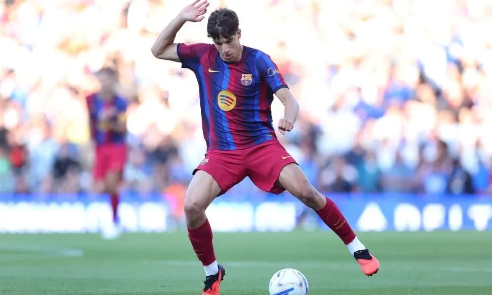 Player dribbling the ball during a match Player dribbling the ball during a match