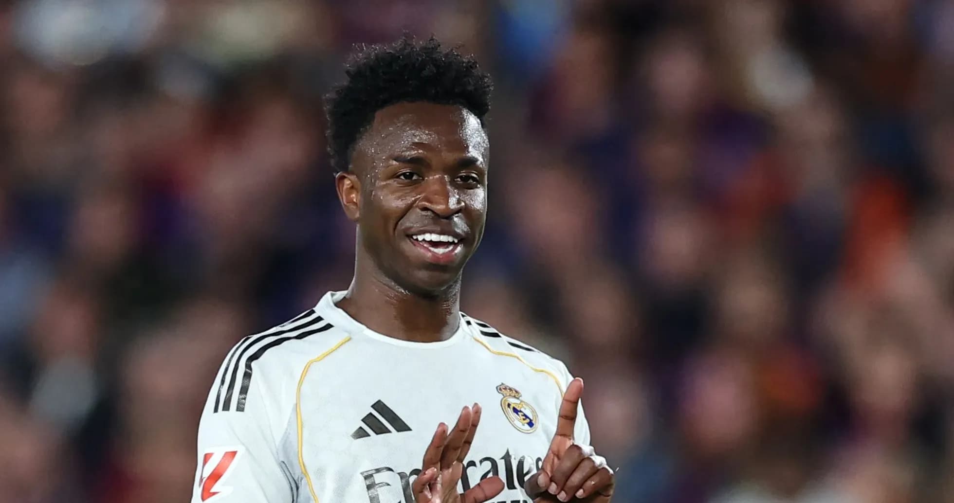Player celebrating during a match wearing Real Madrid jersey Player celebrating during a match wearing Real Madrid jersey