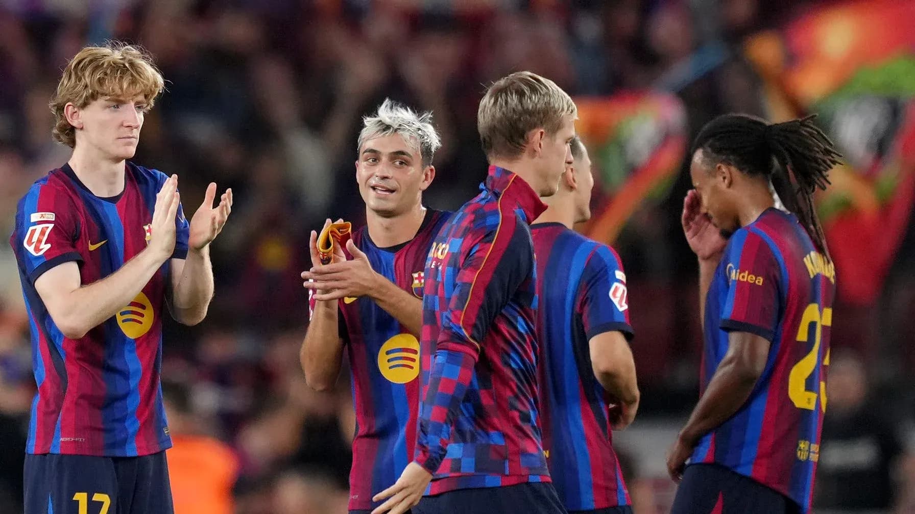 Barcelona players celebrating during a match Barcelona players celebrating during a match