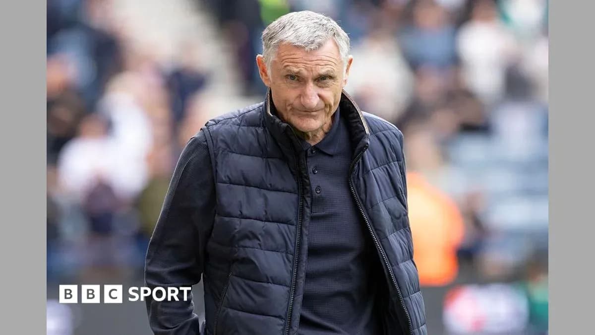 Manager walking on the pitch during a match Manager walking on the pitch during a match