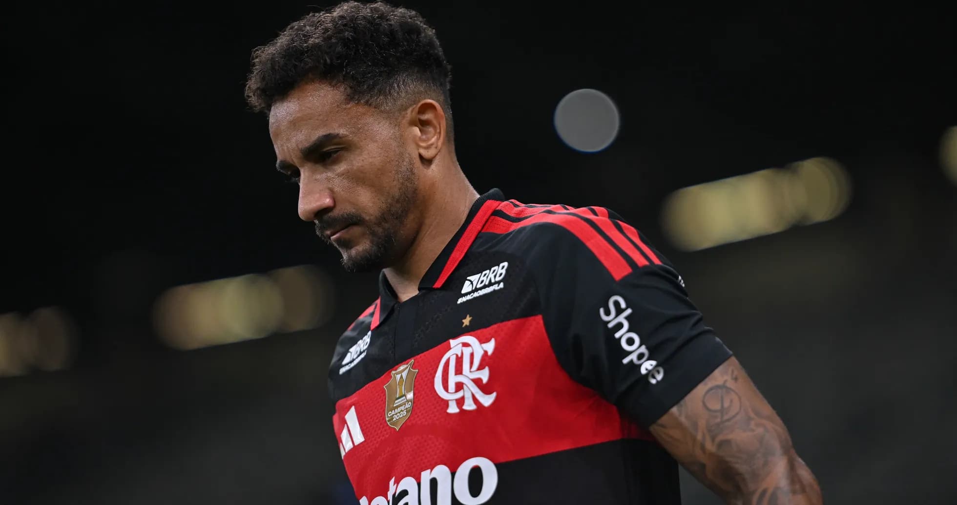 Player in Flamengo jersey walking off the pitch Player in Flamengo jersey walking off the pitch