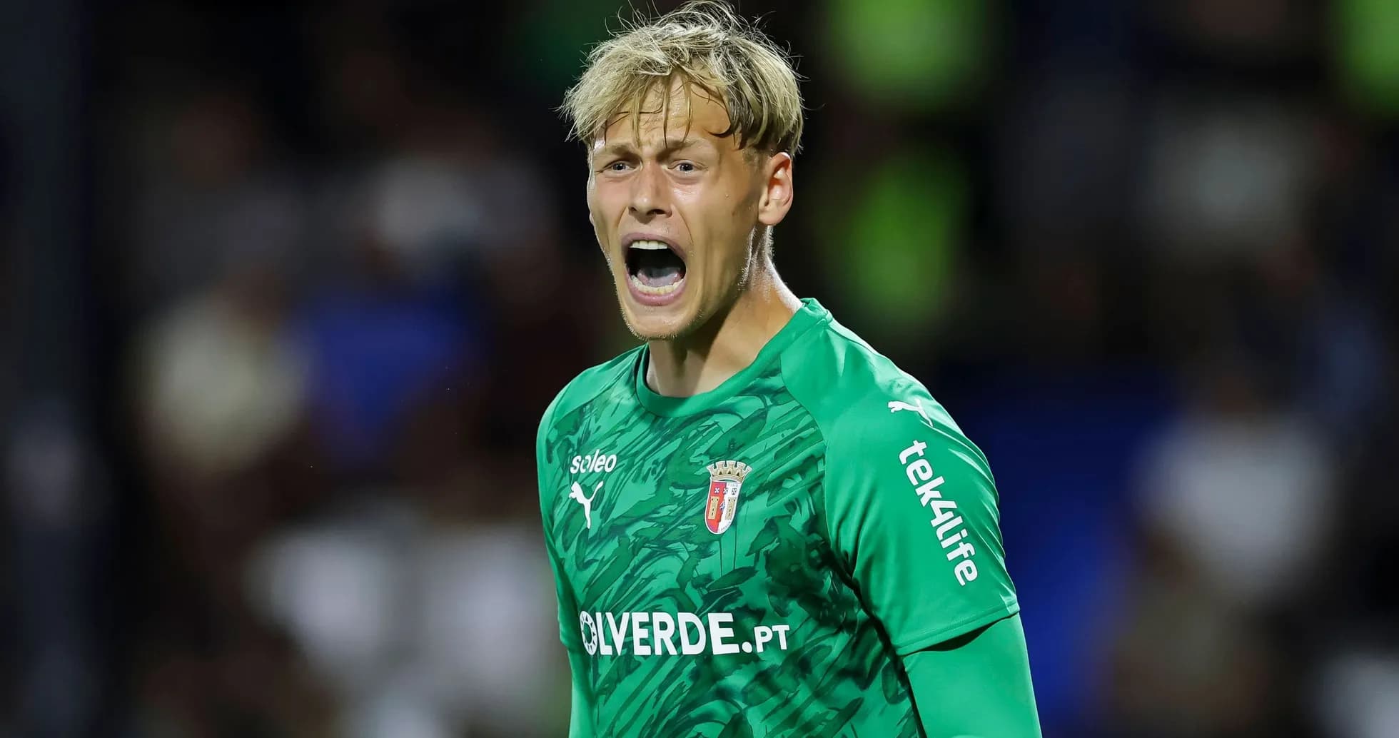 Goalkeeper shouting during a football match Goalkeeper shouting during a football match