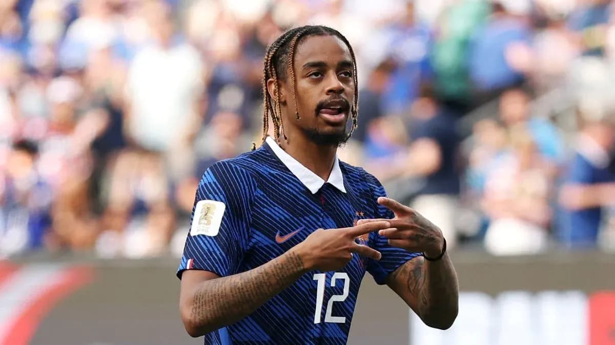 Player gesturing during a football match Player gesturing during a football match
