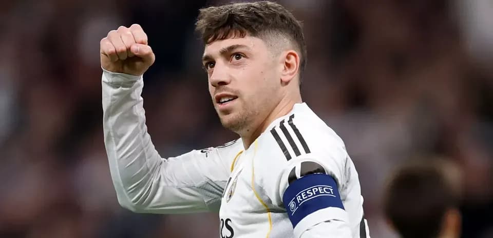 Player celebrating with fist raised during match Player celebrating with fist raised during match