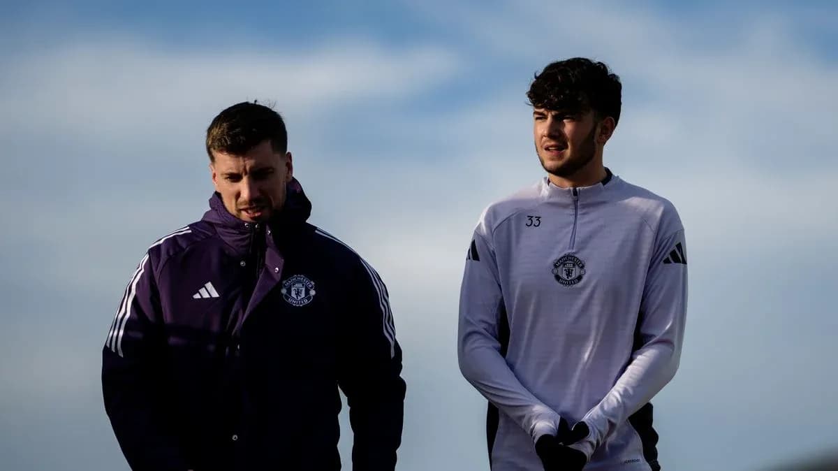 Two Manchester United players walking during training Two Manchester United players walking during training