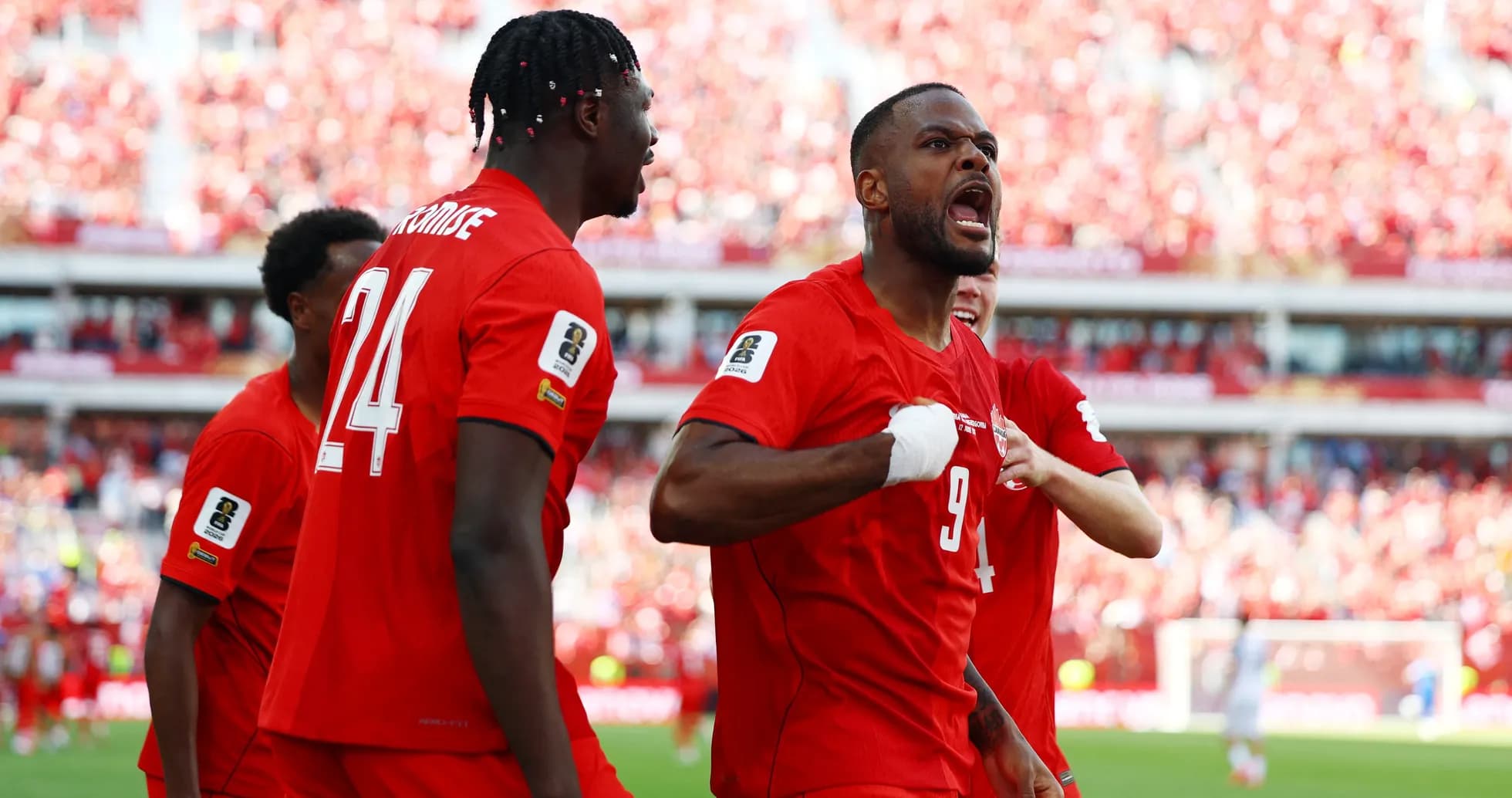 Canada players celebrating a goal during match Canada players celebrating a goal during match