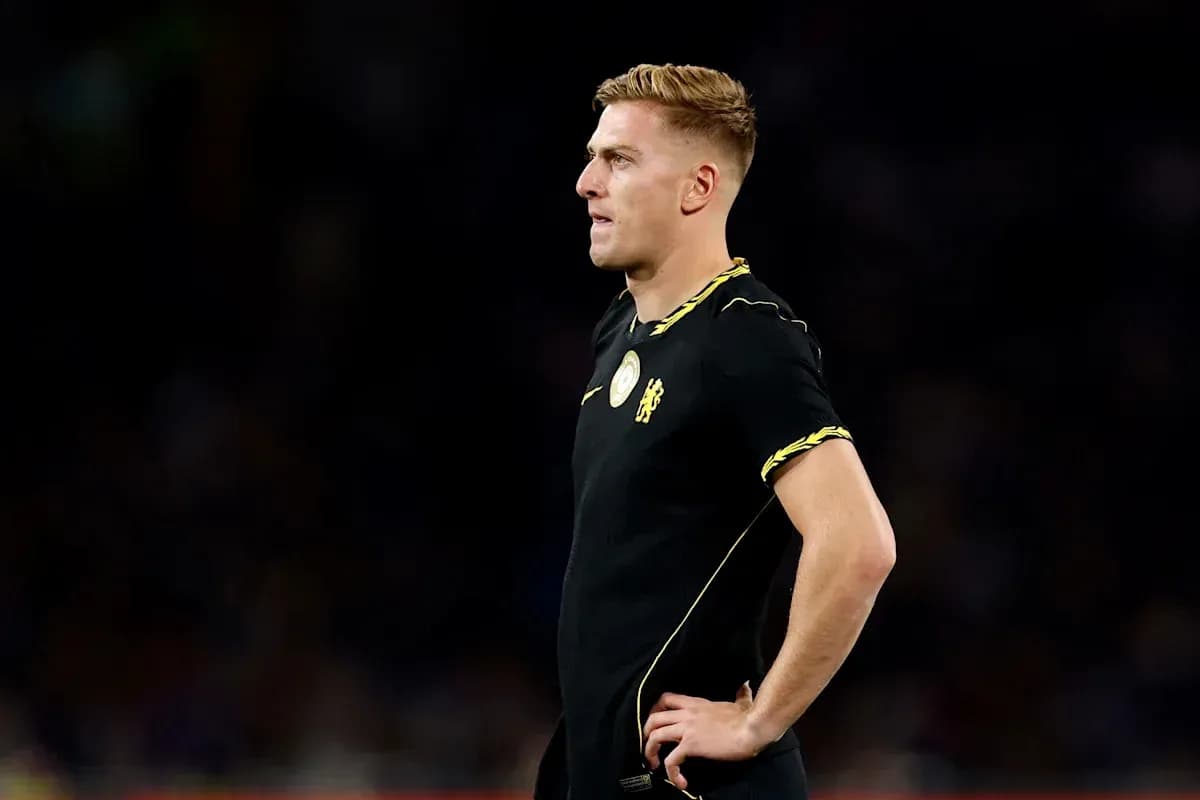 Player in black jersey standing on the field Player in black jersey standing on the field