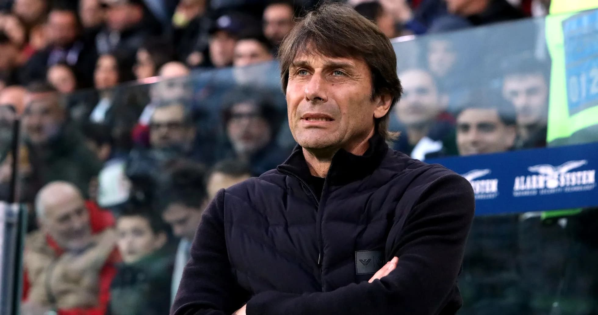 Coach observing the match from the sidelines Coach observing the match from the sidelines