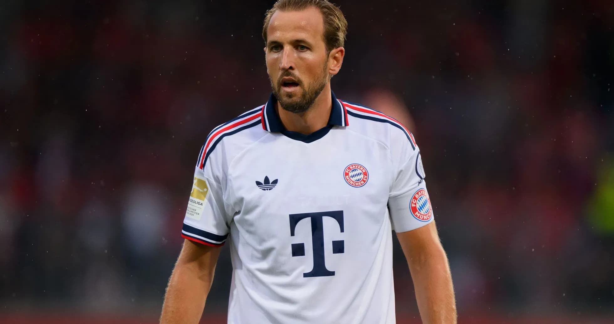 Player wearing Bayern Munich kit on field Player wearing Bayern Munich kit on field