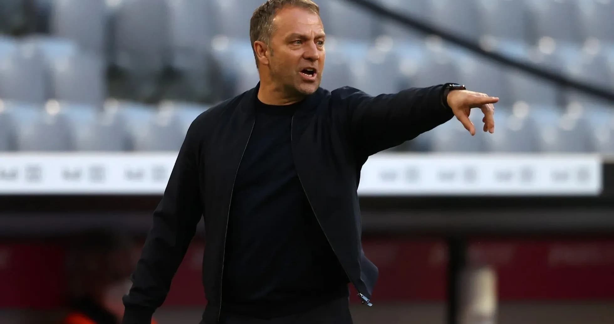 Coach directing players from the sidelines during match Coach directing players from the sidelines during match