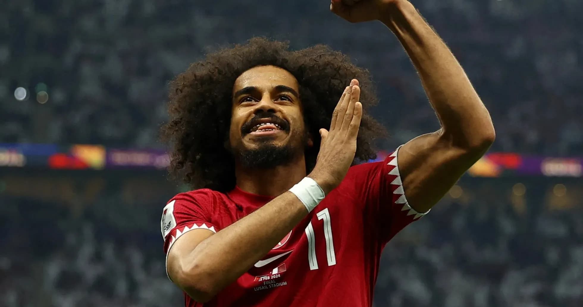 Qatari player celebrating during football match Qatari player celebrating during football match