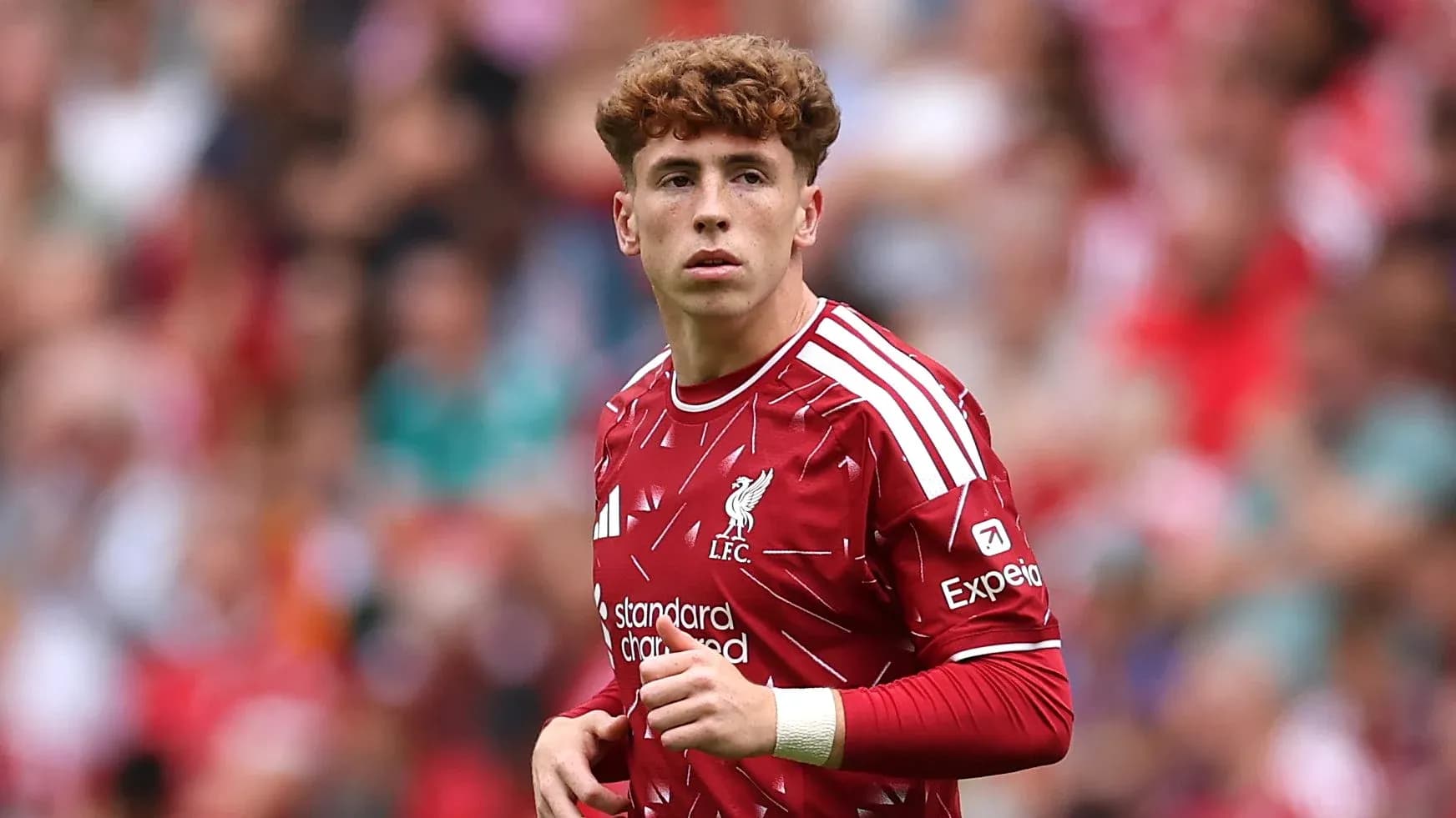 Liverpool player in red kit during match Liverpool player in red kit during match