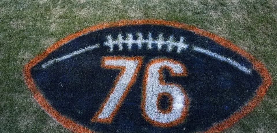 Football field logo with number 76 painted Football field logo with number 76 painted