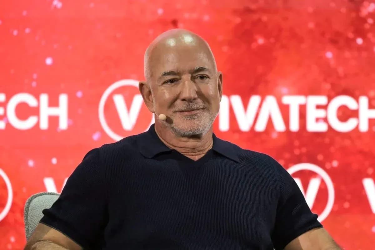 Speaker at VivaTech conference with red backdrop Speaker at VivaTech conference with red backdrop
