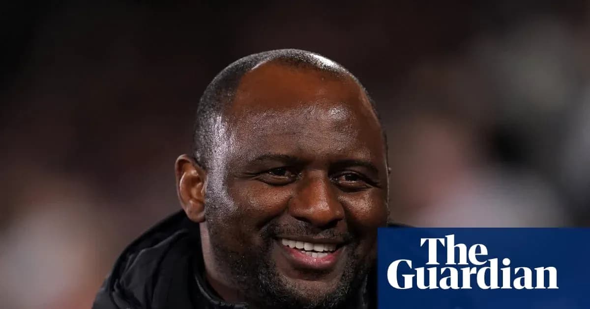 Smiling coach during a match or event Smiling coach during a match or event