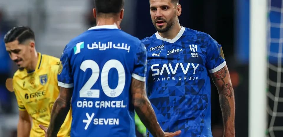 Players discussing during Al-Hilal match Players discussing during Al-Hilal match