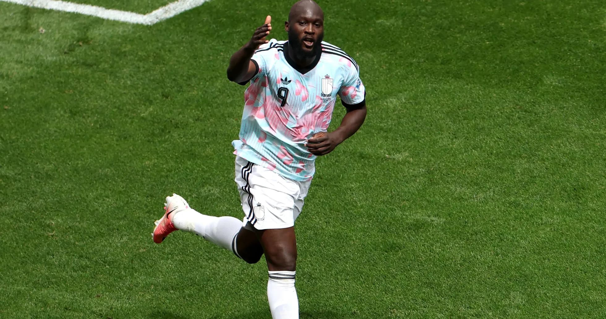 Player celebrating a goal on the field Player celebrating a goal on the field