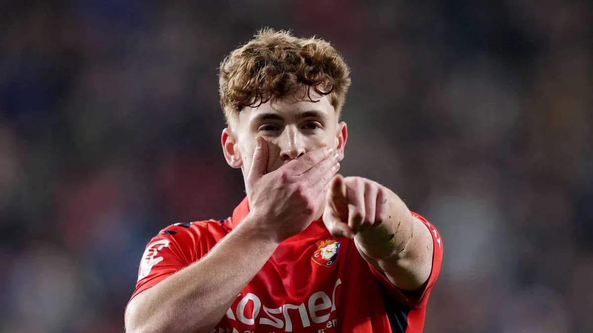 Player celebrating and pointing during match Player celebrating and pointing during match