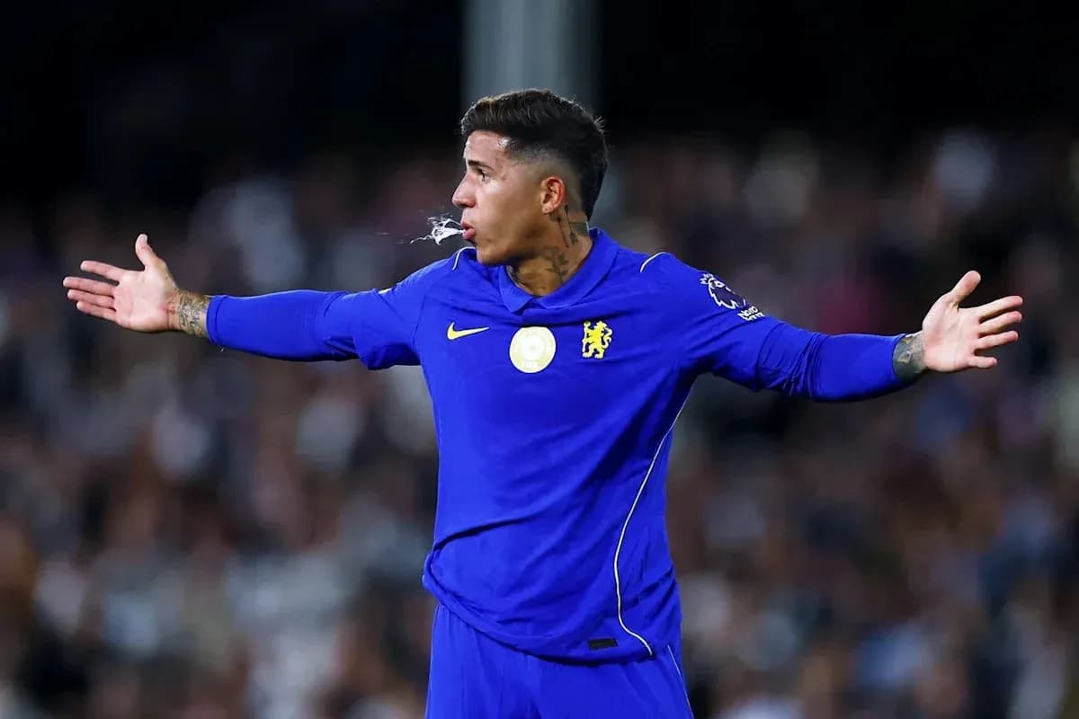Player gesturing during a football match in blue kit Player gesturing during a football match in blue kit