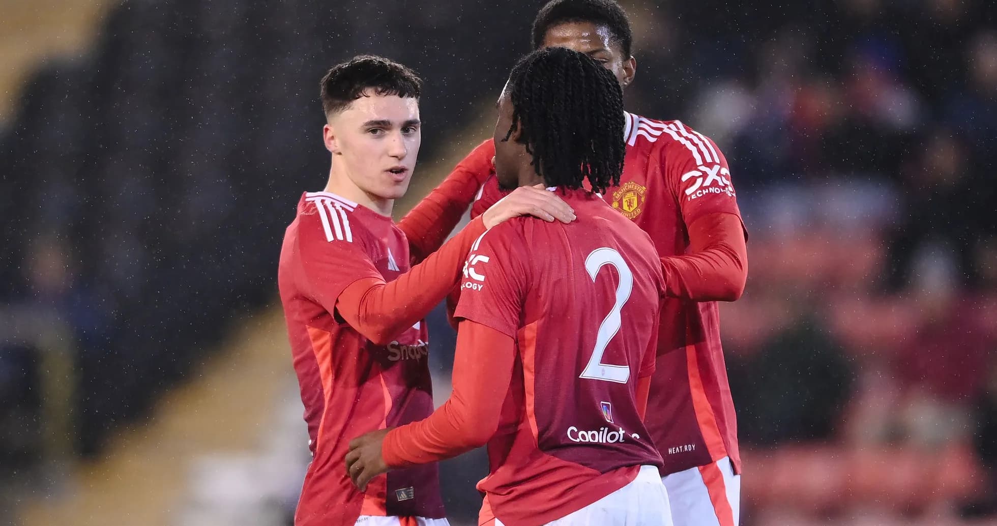 Manchester United players celebrating during a match Manchester United players celebrating during a match