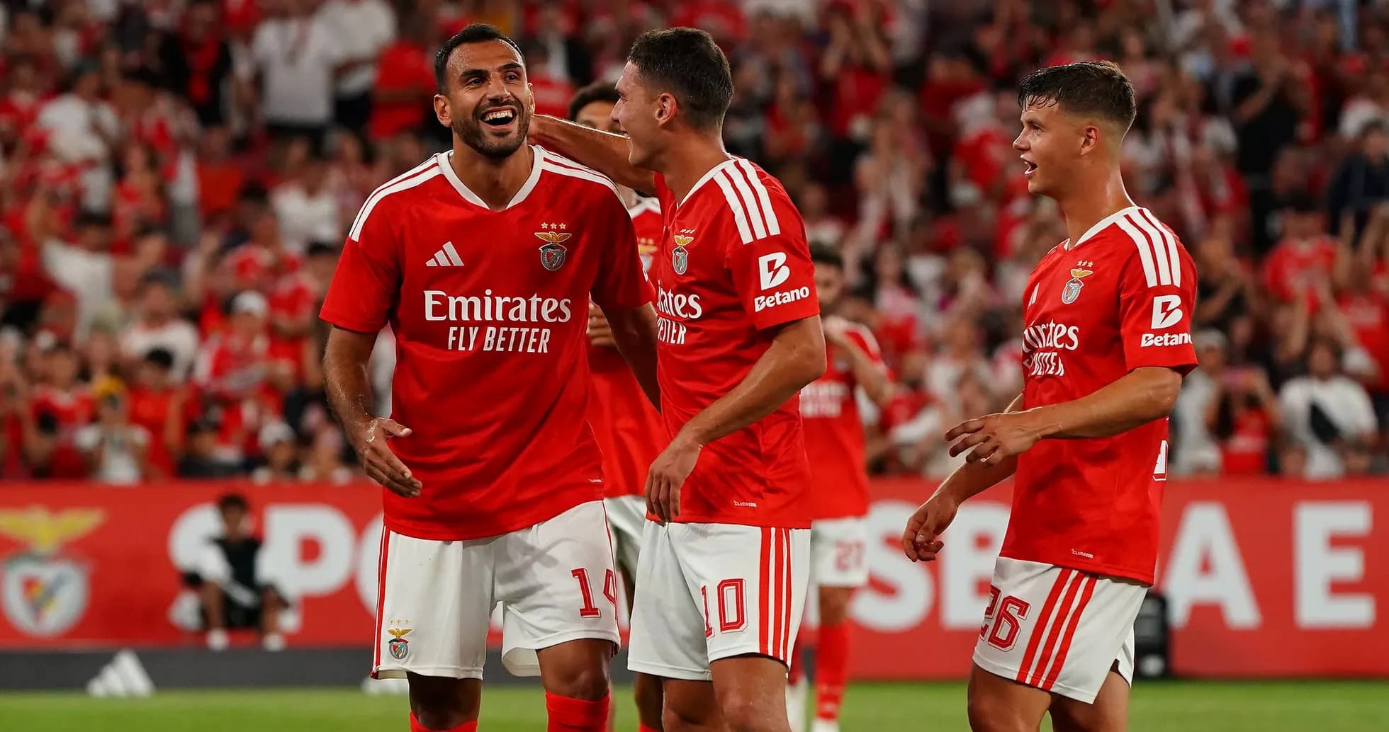 Benfica players celebrating a goal during match Benfica players celebrating a goal during match