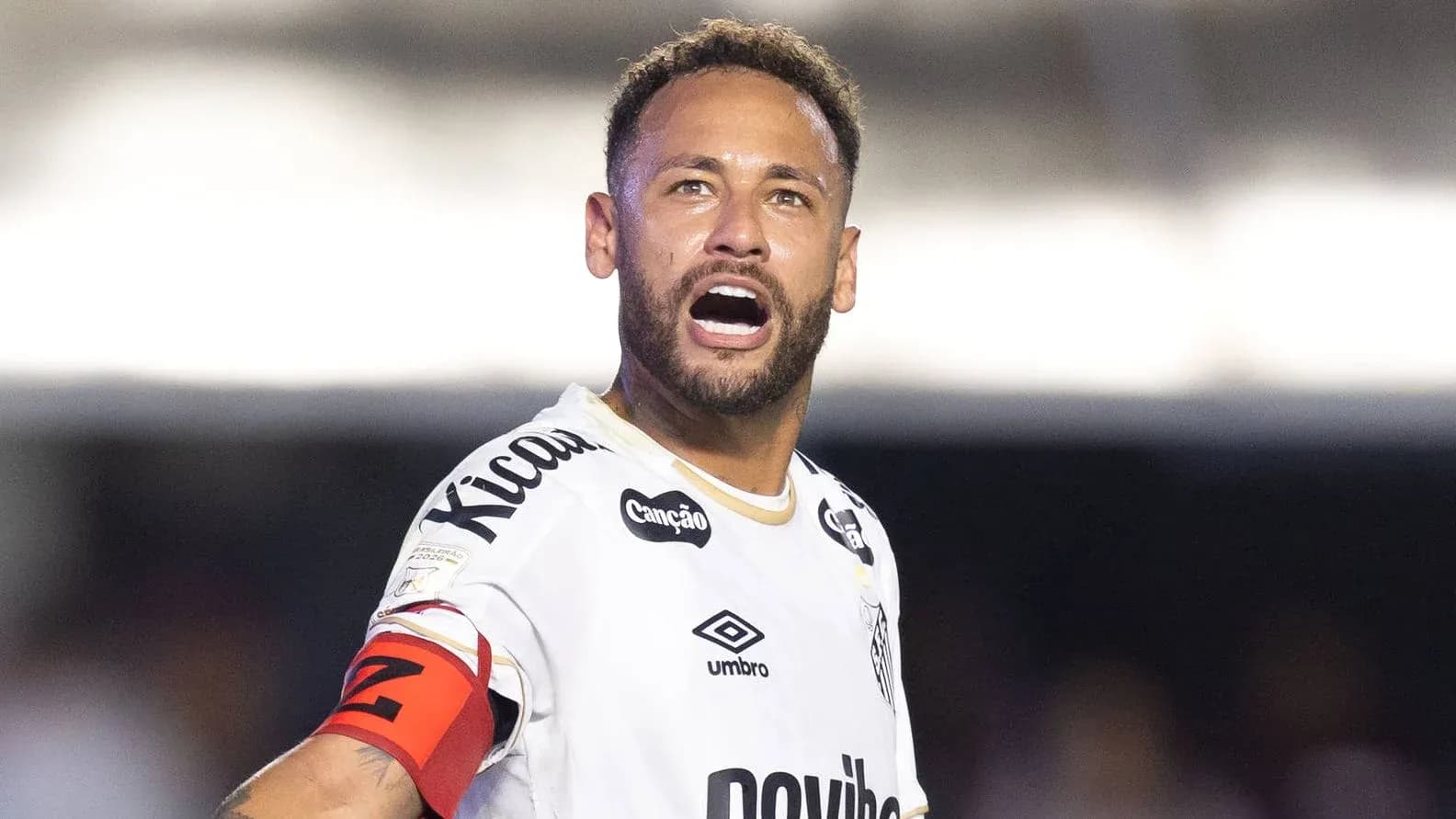 Player shouting during a football match Player shouting during a football match