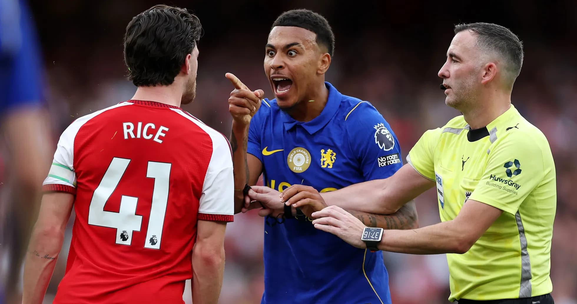 Players arguing during a match, referee intervening Players arguing during a match, referee intervening