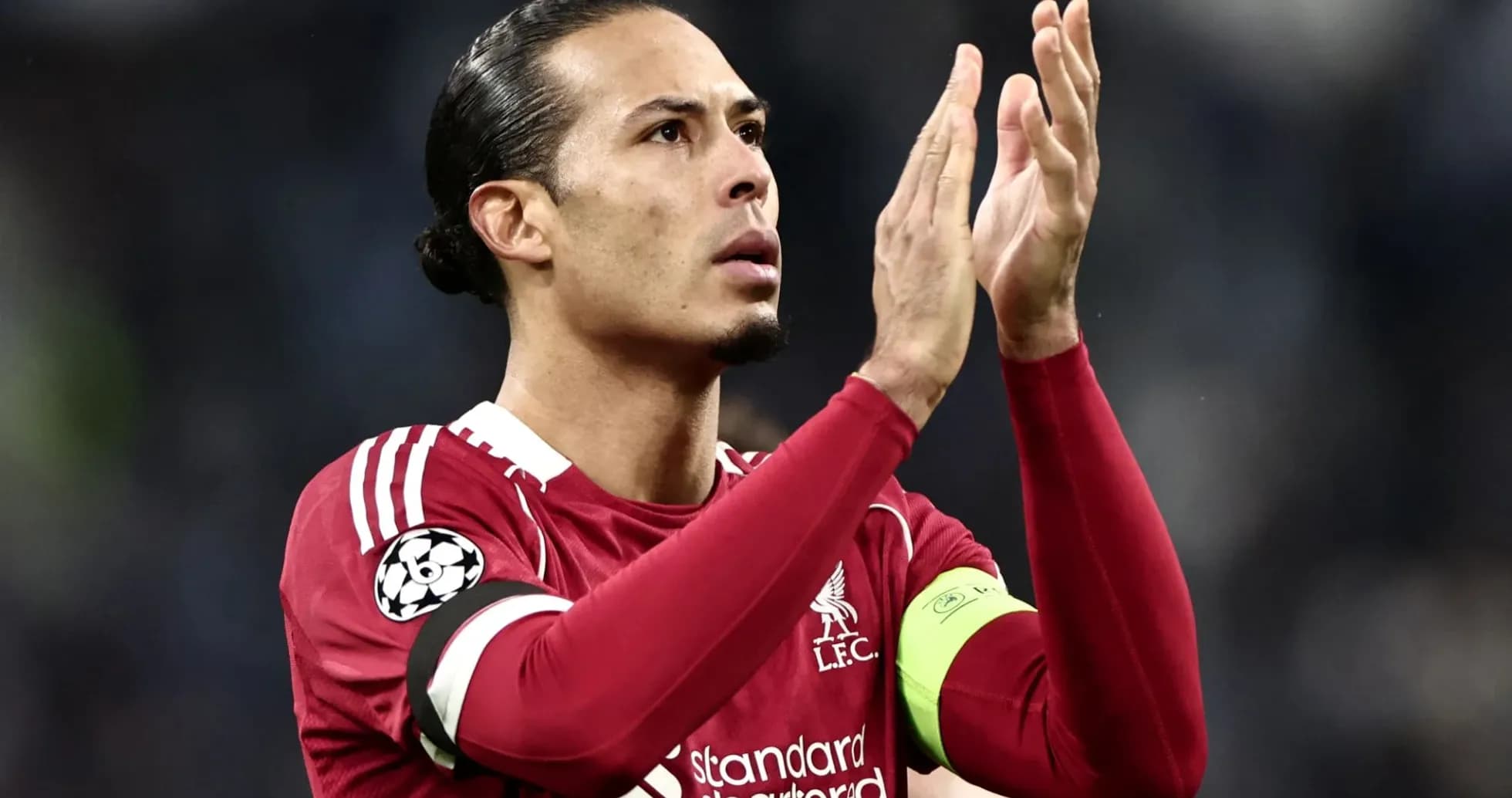 Player applauding fans during match celebration Player applauding fans during match celebration