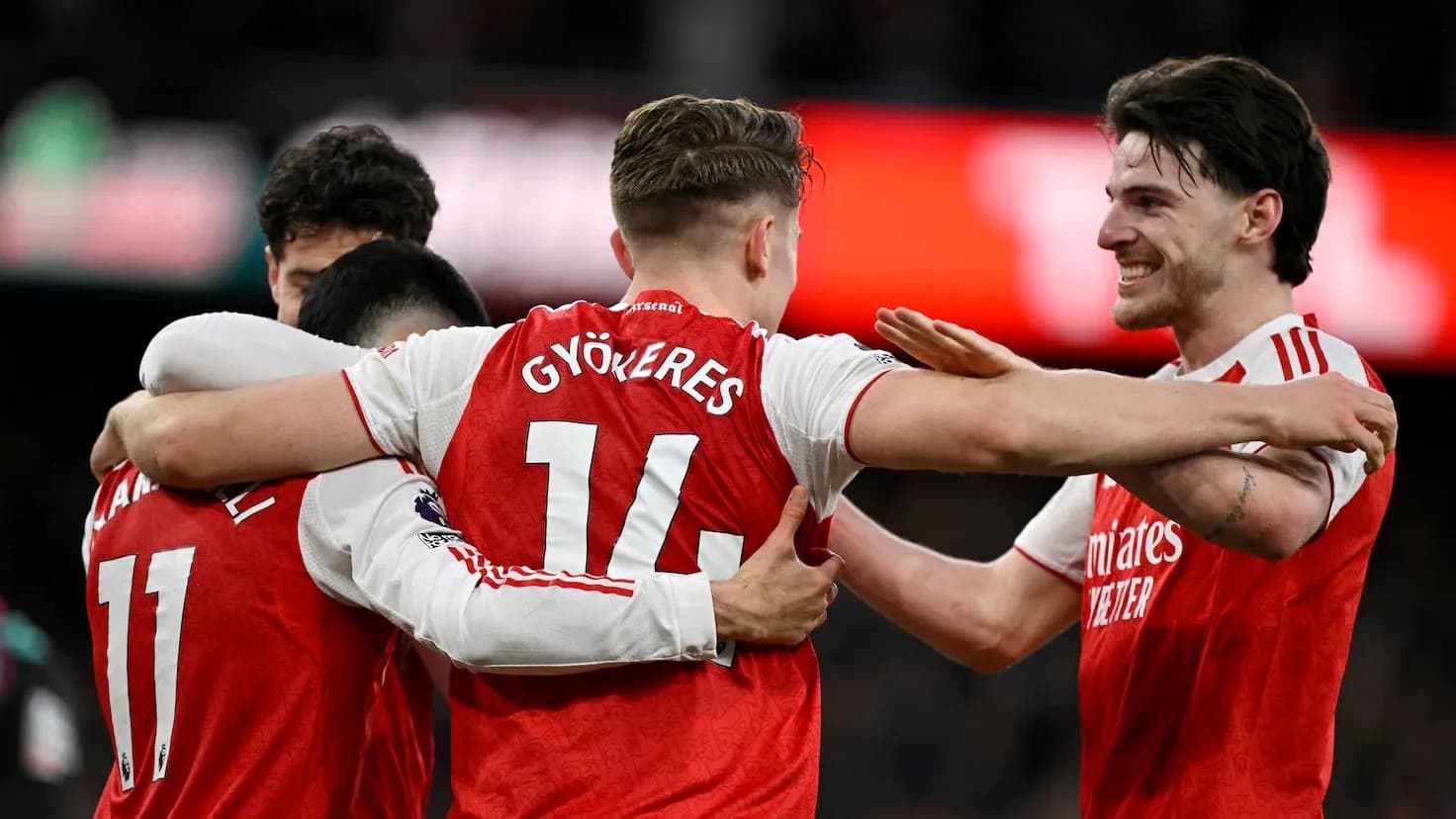 Arsenal players celebrating a goal during match Arsenal players celebrating a goal during match