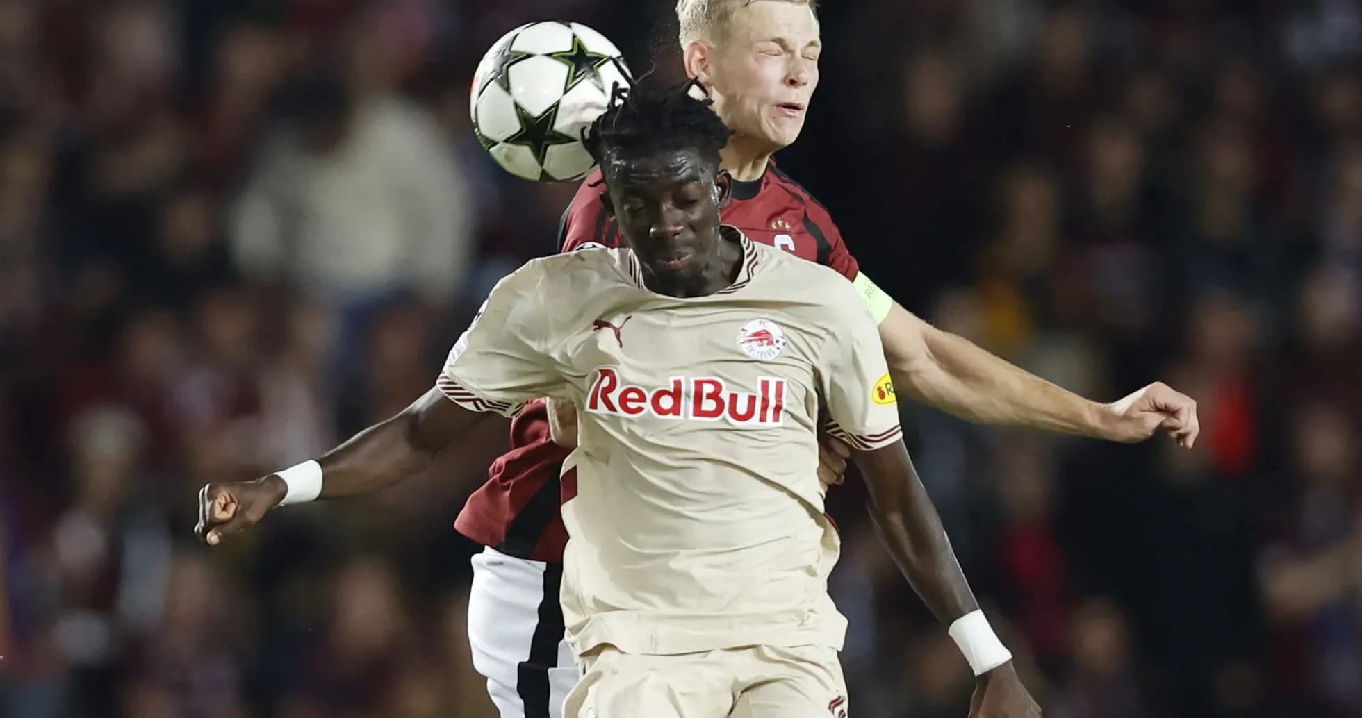 Red Bull Salzburg player challenges Sparta Praha opponent Red Bull Salzburg player challenges Sparta Praha opponent