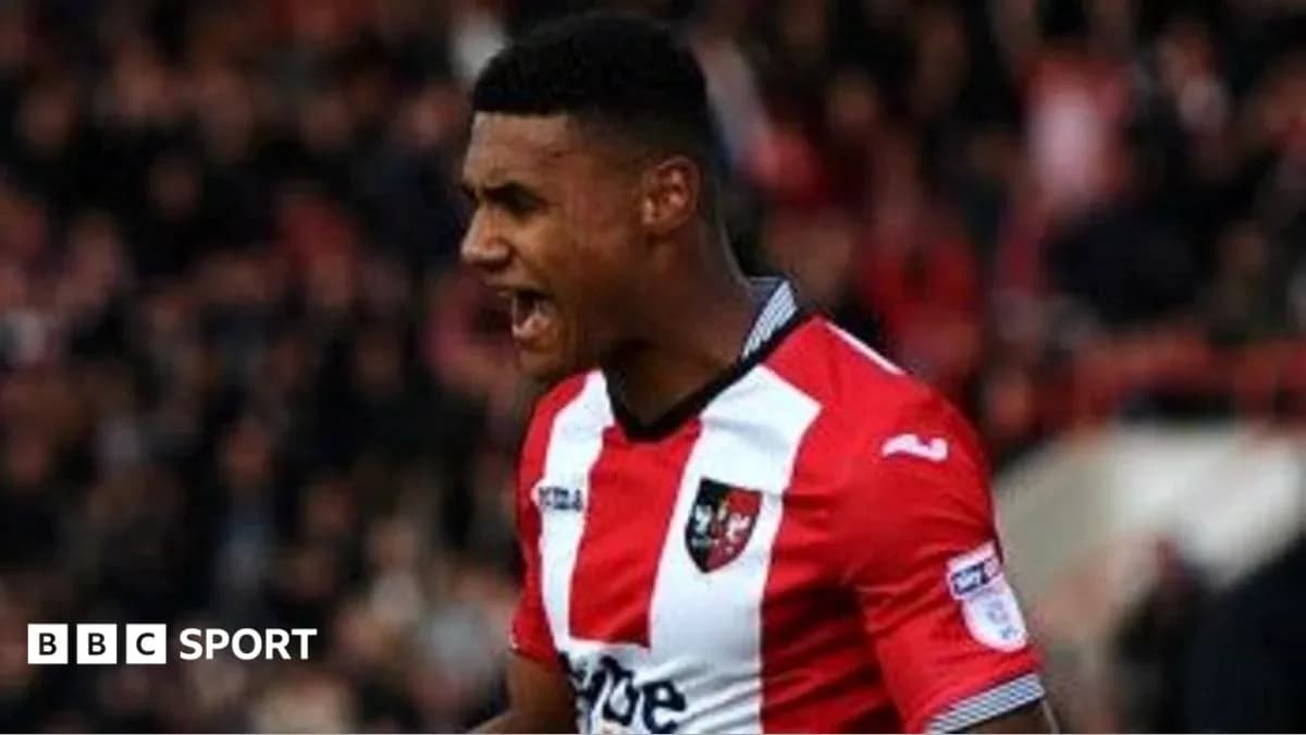 Player celebrating in Exeter City jersey during match Player celebrating in Exeter City jersey during match