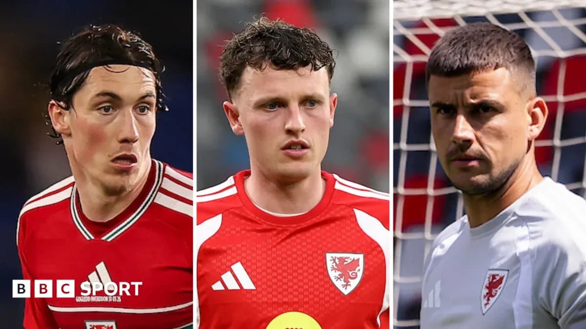 Three Welsh football players posing for a photo Three Welsh football players posing for a photo