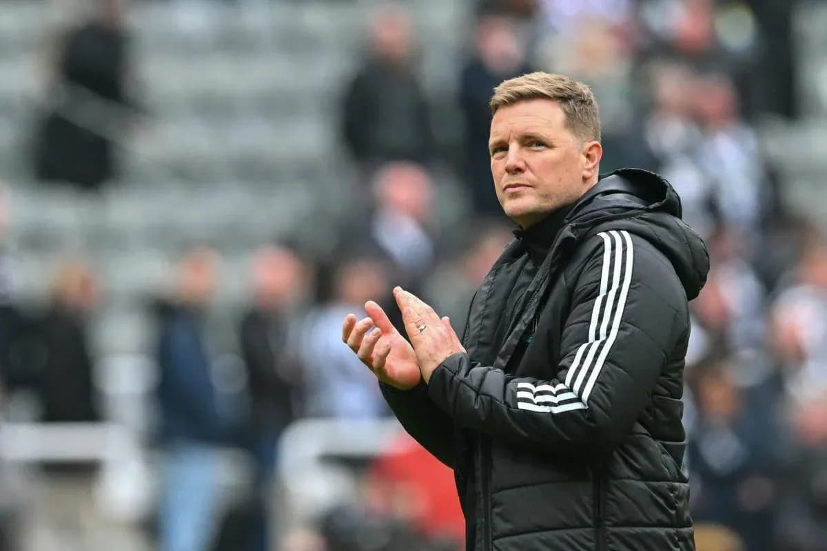 Manager clapping during match at stadium Manager clapping during match at stadium