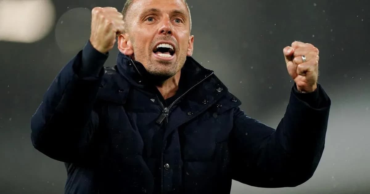 Coach celebrating with clenched fists during match Coach celebrating with clenched fists during match